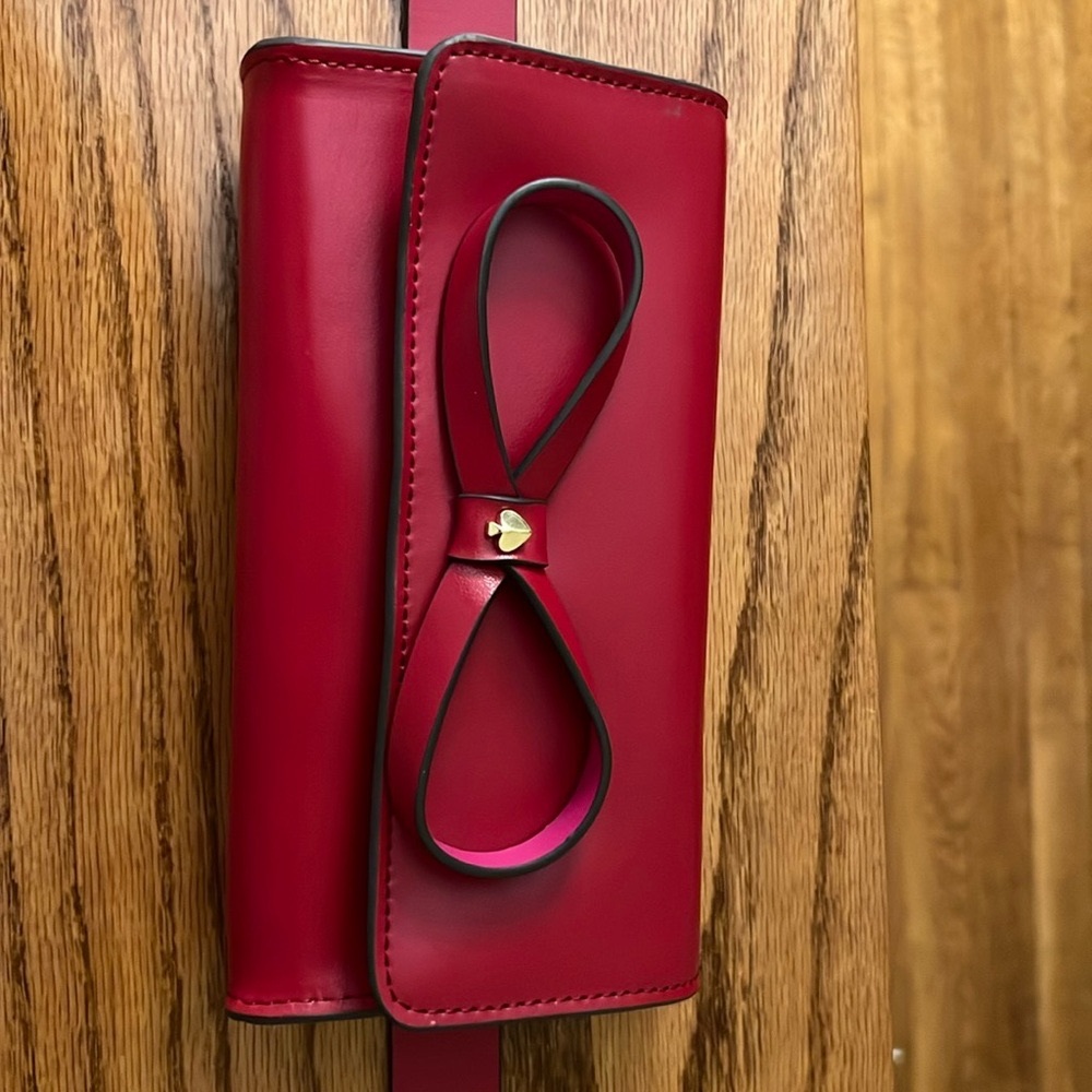New With Tags- Kate Spade  RED BOW Belt Bag S/M 
So cute! Perfect Holiday Gift!